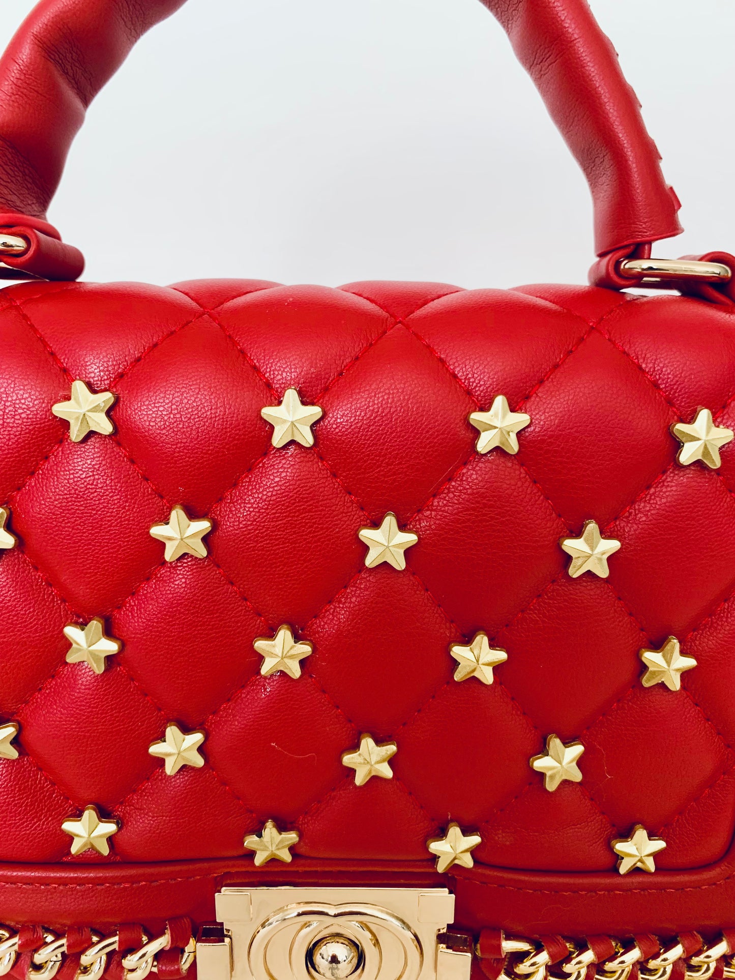 Red Crossbody Handbag with Gold Chain and Star Patterns