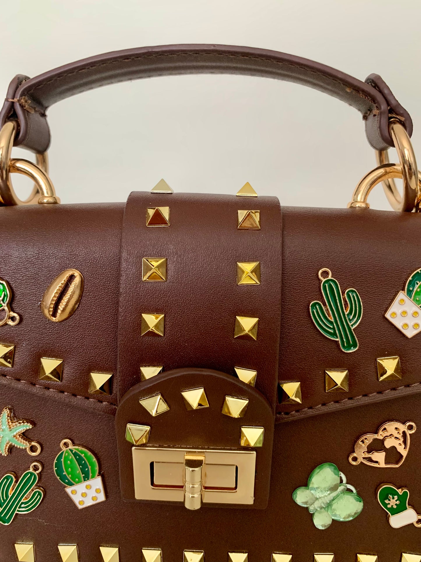 Brown Crossbody bag with Gold Studs and Decorative Pins