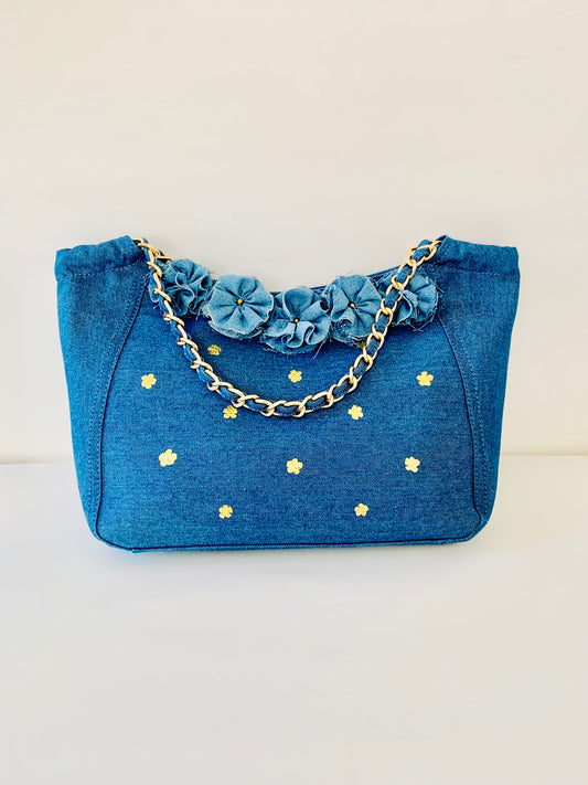 Blue Denim Handbag with Floral Details and Gold Chain Handle