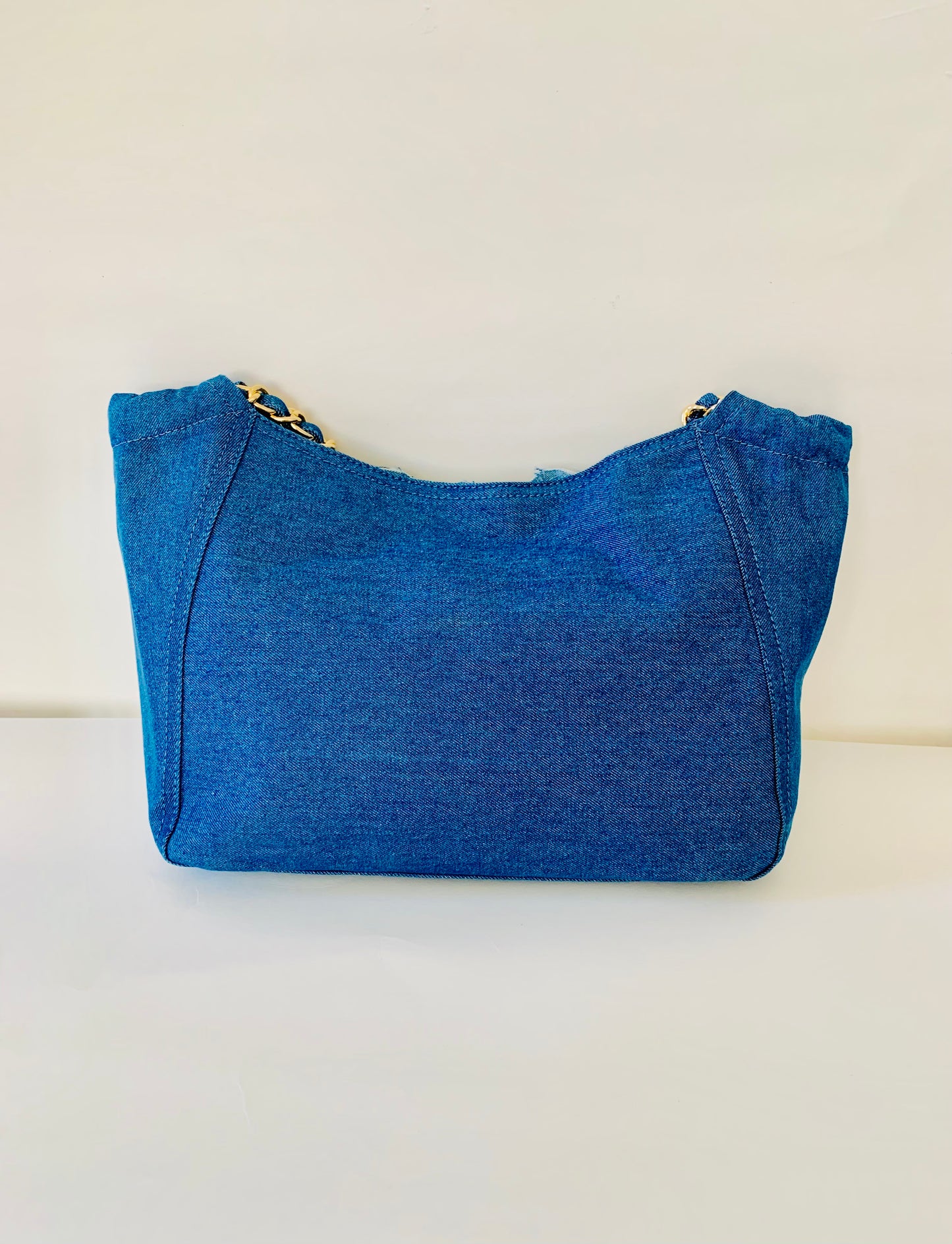Blue Denim Handbag with Floral Details and Gold Chain Handle