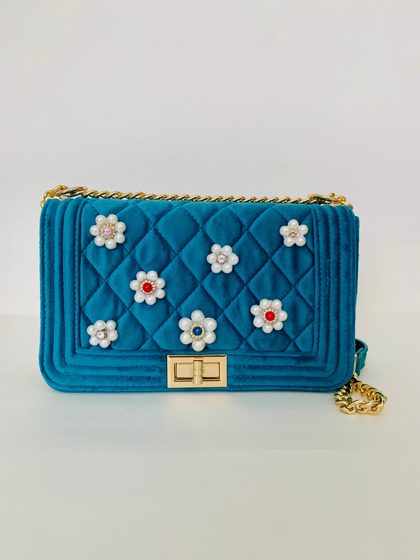 Teal Quilted Crossbody Handbag with Floral Embellishments